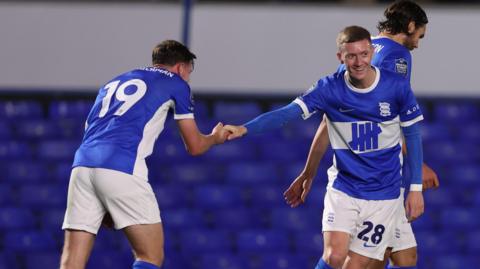 Jay Stansfield celebrates with Birmingham teammate Taylor Gardner-Hickman.