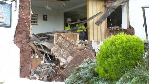 Collapsed wall at pub in Devon