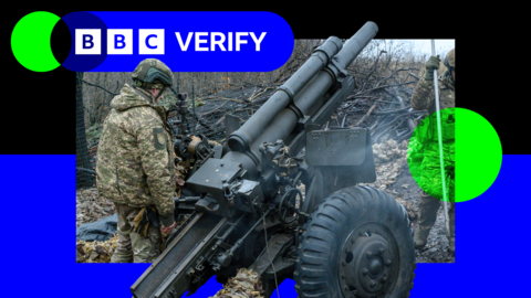 Ukrainian army soldiers use a 105mm American M101 Howitzer artillery piece on Ukraine's northeastern frontline with Russia