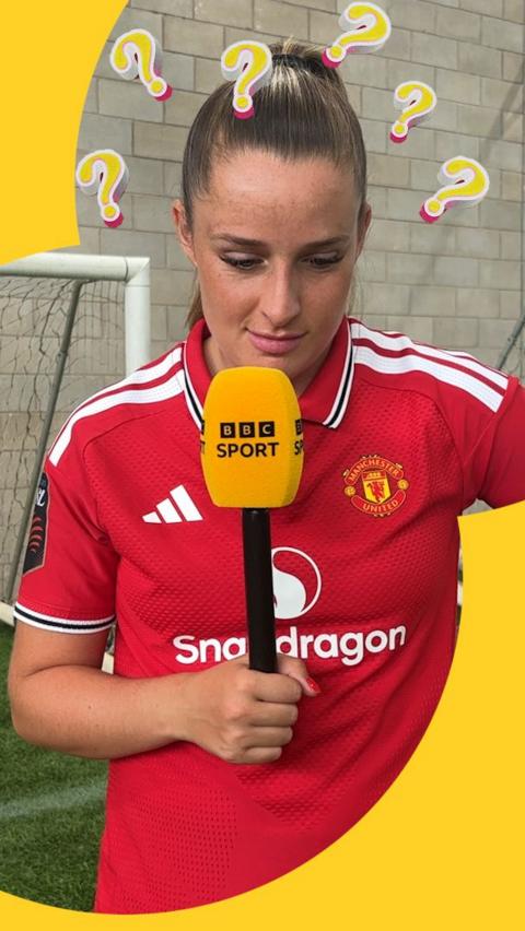 Ella Toone holding a microphone thinks about answer to riddle 