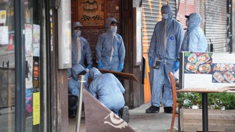 Forensic officers at scene of shooting