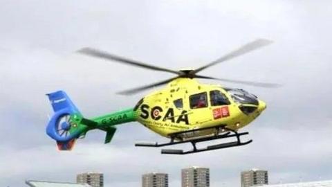 Scotland's Charity Air Ambulance, yellow helicopter in flight (file image).