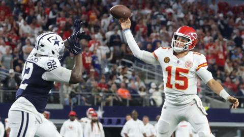 Patrick Mahomes throws a pass against the Dallas Cowboys