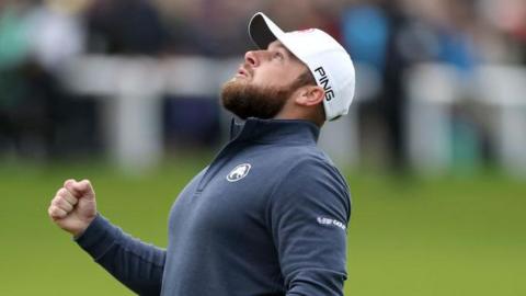 Tyrrell Hatton looks to the skies after his win