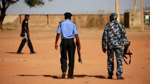 Police patrol the scene of a kidnapping in Nigeria