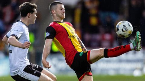  Ayr United's Dylan Watret and Partick Thistle's Aidan Fitzpatrick
