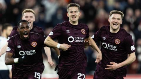 Hearts celebrate