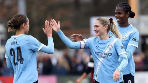 Manchester City players celebrate during their Women's FA Cup win over Bournemouth