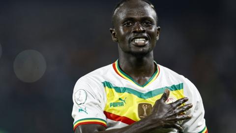 Sadio Mane celebrates a goal for Senegal against Cameroon