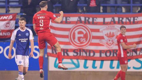 Paul O'Neill celebrates scoring for Larne