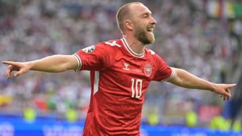 Christian Eriksen celebrates