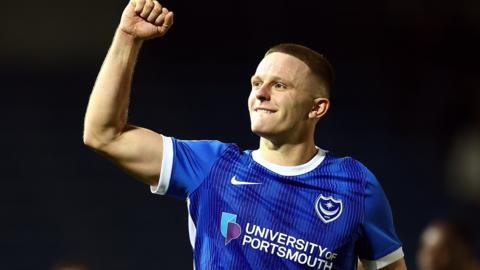 Colby Bishop celebrates scoring a goal for Portsmouth