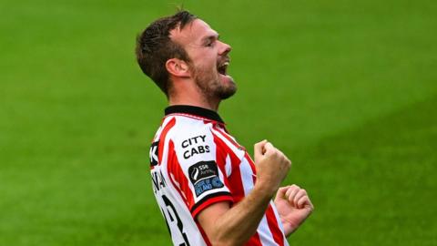 Cameron Dummigan celebrates his goal