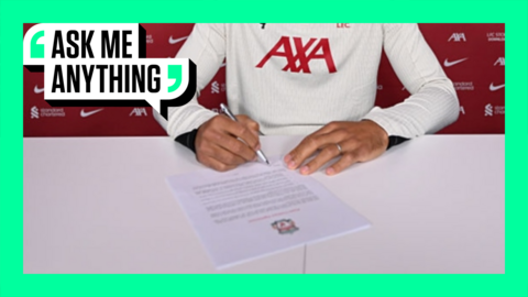 Liverpool player signing a contract