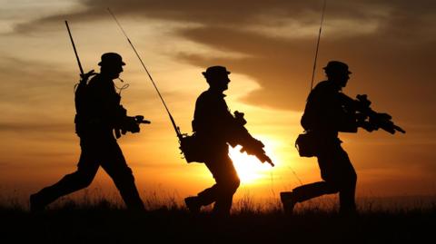 Soldiers from B company 2nd Battalion, The Royal Regiment of Scotland at sunset as they take part in Exercise Askari Storm on the outskirts of Nanyuki, Kenya