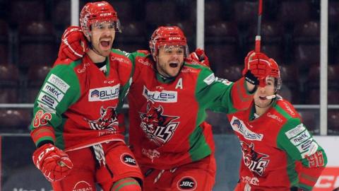 Cardiff Devils celebrating Jake Coughler’s quarter-final goal against Dundee