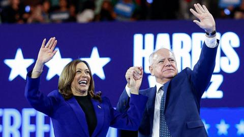 Kamala Harris and Tim Walz at a campaign event