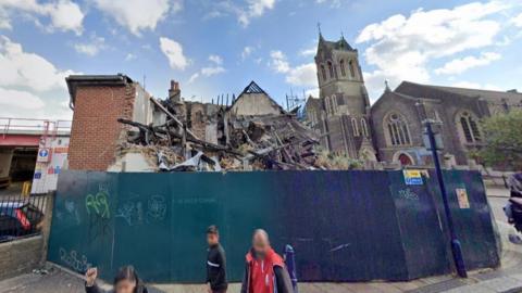 The former New Inn pub. It lies in ruins following a blaze in 2022