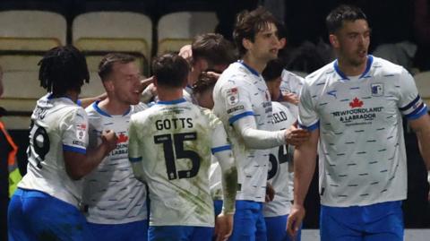 Barrow players celebrate their second goal against Notts County