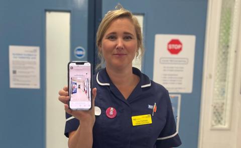 Nurse holding phone