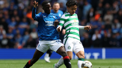 Mohamed Diomande of Rangers and Reo Hetate of Celtic fight for the ball