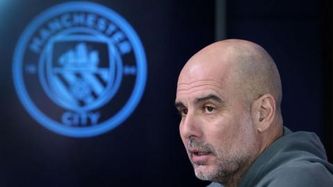 Pep Guardiola at a news conference