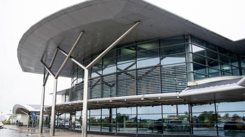 General exterior view of Guernsey Airport, a minor international airport on the island of Guernsey and also largest airport in the Bailiwick of Guernsey.
