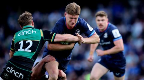 Jordie Barrett is tackled