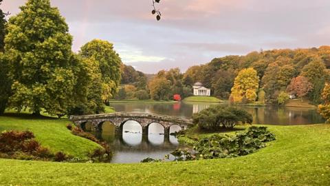 Image shows Stourhead Estate, with the Stourhead Pantheon in the background 
