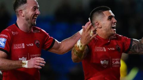 Salford Red Devils pair Ryan Brierley and Jayden Nikorima celebrate