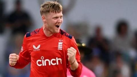 Dan Mousley celebrates taking a wicket for England in a white-ball international