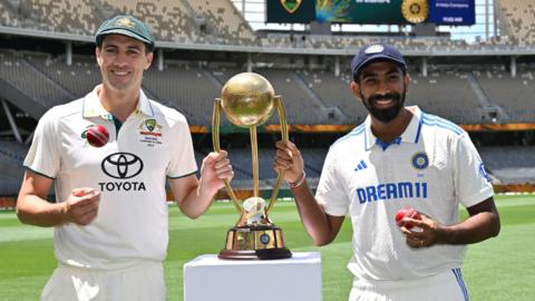 Australia captain Pat Cummins with India stand-in skipper Jasprit Bumrah ahead of the first Test