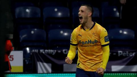 Derby's Jerry Yates celebrates scoring at Preston