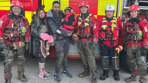 Essex firefighters rescued a family stuck in a boat on mudflats