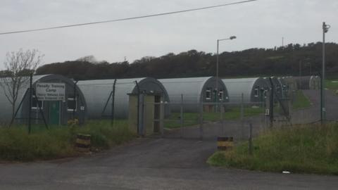 There are plans to house asylum seekers at a military training camp in Pembrokeshire