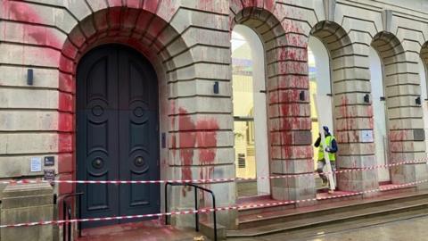 Paint splattered on building