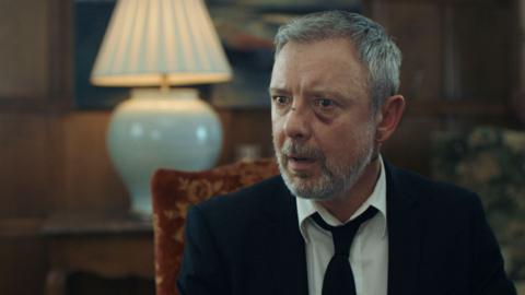 John Simm as Gray Wright in I, Jack Wright, with a shocked expression on his face