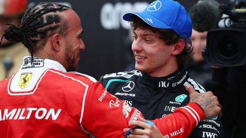 Lewis Hamilton and Kimi Antonelli hug after the Canadian Grand Prix 