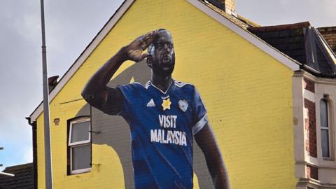 The mural of Sol Bamba on the side of a Cardiff house