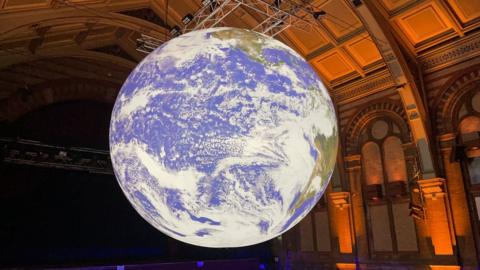 Gaia, a giant globe featuring NASA imagery of the Earth's surface, at Ipswich Town Hall