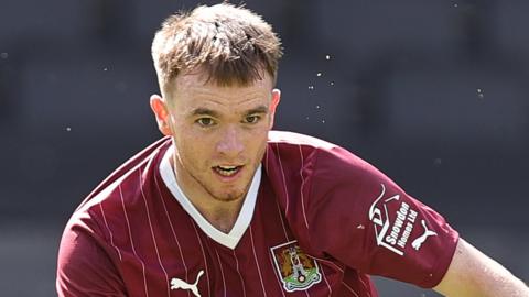 Marc Leonard playing for Northampton against MK Dons in a pre-season friendly