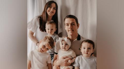 Abbey Silvester with her partner and four of their children