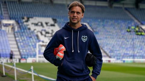 Portsmouth defender Ryley Towler arrives for a game at Fratton Park