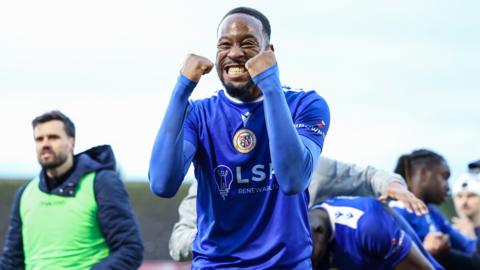 Bromley goalscorer Nicke Kabamba celebrates their victory over Fleetwood