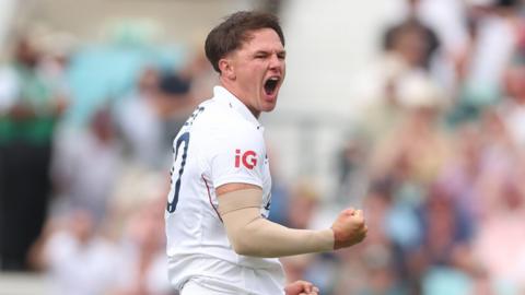 Sonny Baker celebrates taking a wicket
