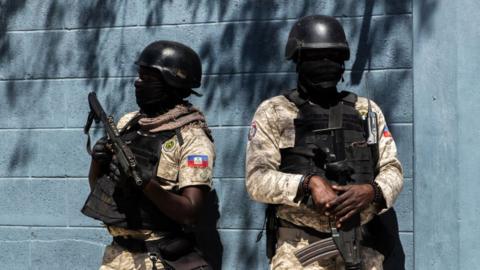 Police at the funeral of three police officers killed by armed gangs, at the National Police Academy in Port-au-Prince, Haiti, on January 31, 2023.