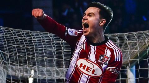 Timur Tutierov punches the air celebrating his goal