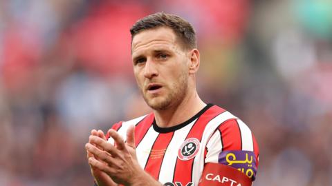 Billy Sharp applauds