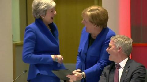 Theresa May and Angela Merkel