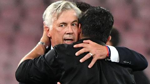 Carlo Ancelotti and Gennaro Gattuso embrace